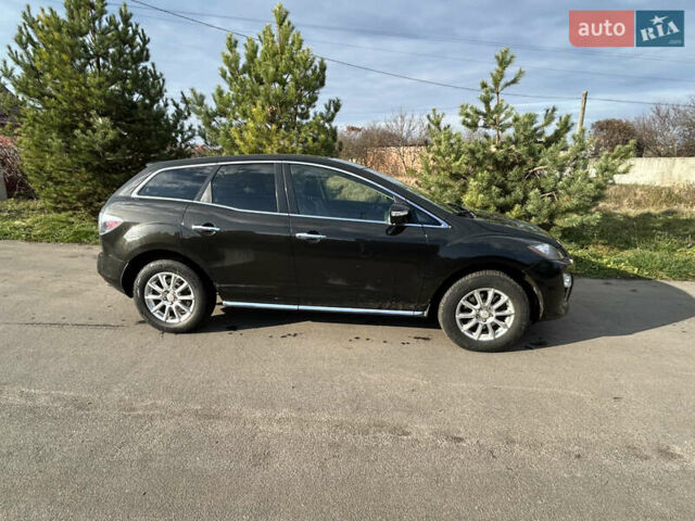 Черный Мазда СХ-7, объемом двигателя 2.2 л и пробегом 211 тыс. км за 9950 $, фото 2 на Automoto.ua