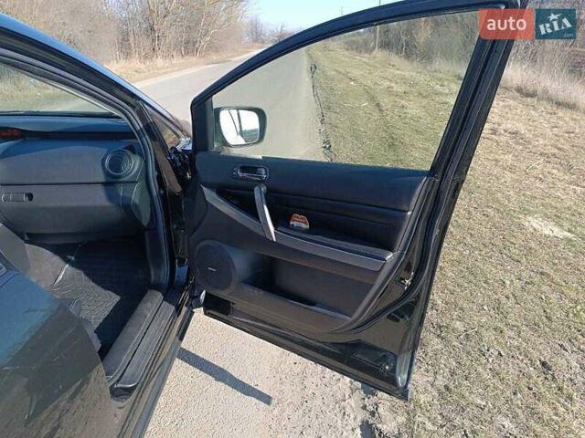 Черный Мазда СХ-7, объемом двигателя 2.2 л и пробегом 215 тыс. км за 10500 $, фото 13 на Automoto.ua