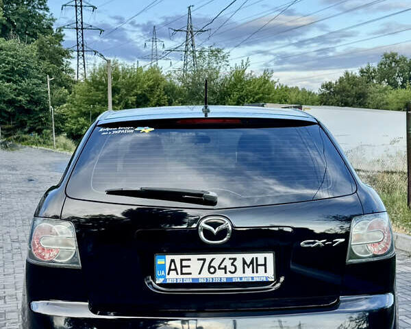 Черный Мазда СХ-7, объемом двигателя 2.49 л и пробегом 250 тыс. км за 9000 $, фото 5 на Automoto.ua