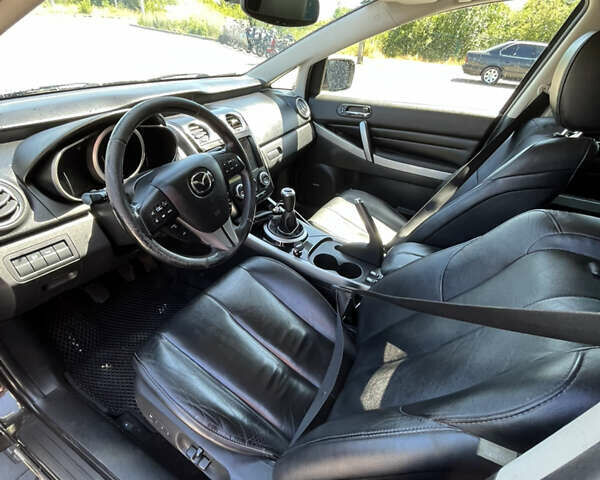 Черный Мазда СХ-7, объемом двигателя 2.2 л и пробегом 296 тыс. км за 9300 $, фото 4 на Automoto.ua