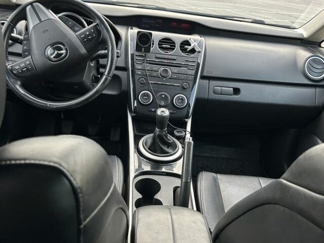 Черный Мазда СХ-7, объемом двигателя 2.2 л и пробегом 242 тыс. км за 8011 $, фото 1 на Automoto.ua