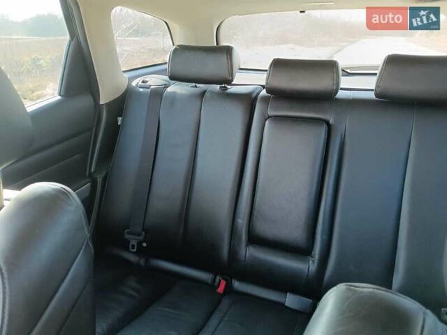 Черный Мазда СХ-7, объемом двигателя 2.2 л и пробегом 225 тыс. км за 9950 $, фото 3 на Automoto.ua