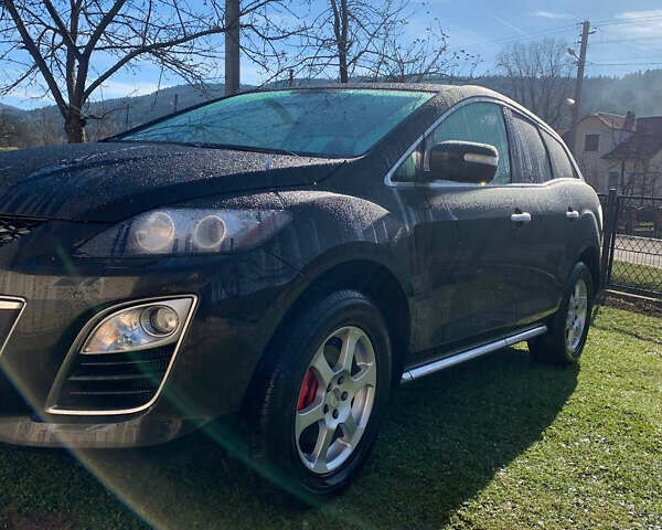 Черный Мазда СХ-7, объемом двигателя 2.2 л и пробегом 174 тыс. км за 11600 $, фото 20 на Automoto.ua