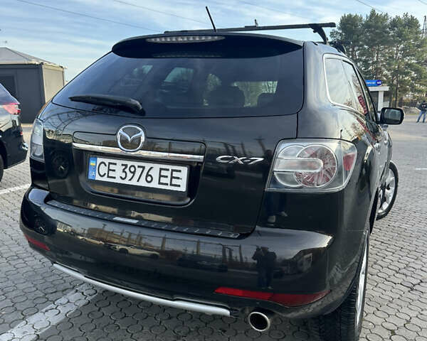 Черный Мазда СХ-7, объемом двигателя 2.18 л и пробегом 198 тыс. км за 10199 $, фото 12 на Automoto.ua