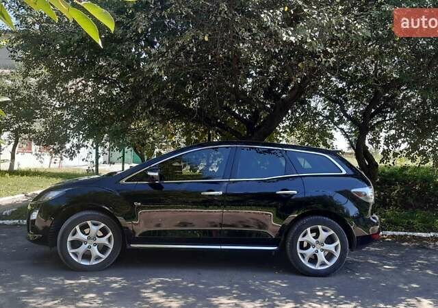 Чорний Мазда СХ-7, об'ємом двигуна 2.2 л та пробігом 251 тис. км за 9900 $, фото 4 на Automoto.ua