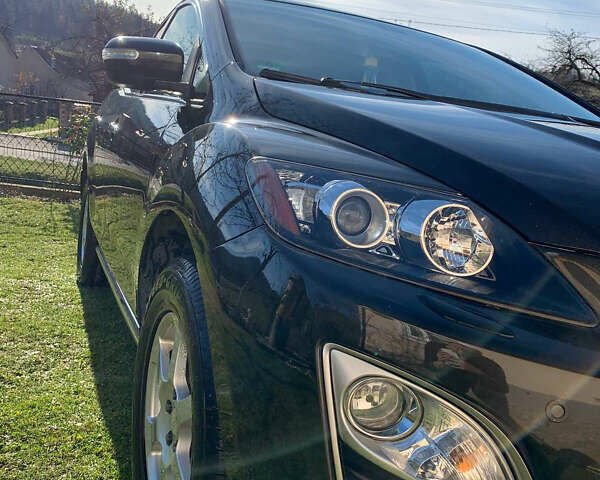 Черный Мазда СХ-7, объемом двигателя 2.2 л и пробегом 174 тыс. км за 11600 $, фото 35 на Automoto.ua