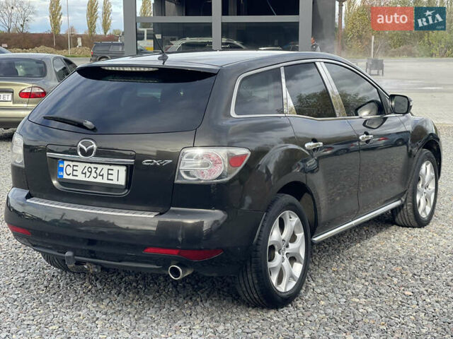 Черный Мазда СХ-7, объемом двигателя 2.18 л и пробегом 302 тыс. км за 8750 $, фото 6 на Automoto.ua