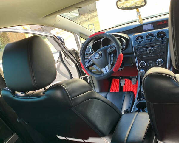 Черный Мазда СХ-7, объемом двигателя 2.2 л и пробегом 174 тыс. км за 11600 $, фото 9 на Automoto.ua