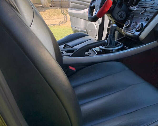 Черный Мазда СХ-7, объемом двигателя 2.2 л и пробегом 174 тыс. км за 11600 $, фото 2 на Automoto.ua