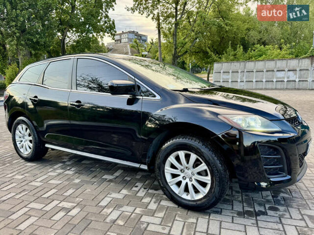 Черный Мазда СХ-7, объемом двигателя 2.49 л и пробегом 250 тыс. км за 9000 $, фото 1 на Automoto.ua
