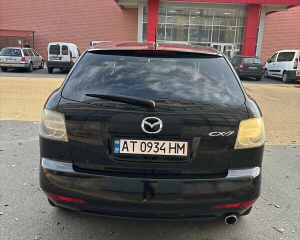 Чорний Мазда СХ-7, об'ємом двигуна 2.49 л та пробігом 290 тис. км за 9800 $, фото 4 на Automoto.ua