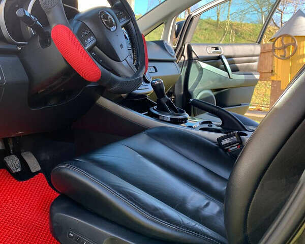 Черный Мазда СХ-7, объемом двигателя 2.2 л и пробегом 174 тыс. км за 11600 $, фото 18 на Automoto.ua