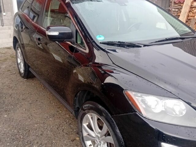 Черный Мазда СХ-7, объемом двигателя 2.2 л и пробегом 218 тыс. км за 5000 $, фото 1 на Automoto.ua