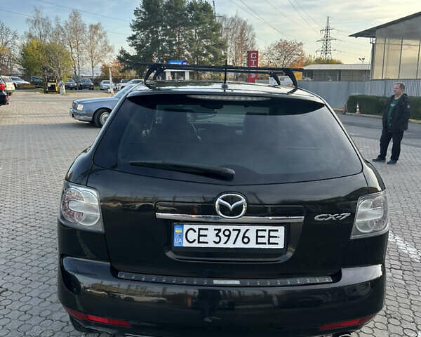 Черный Мазда СХ-7, объемом двигателя 2.18 л и пробегом 198 тыс. км за 10199 $, фото 13 на Automoto.ua