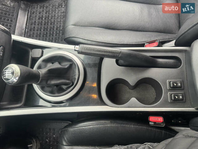 Чорний Мазда СХ-7, об'ємом двигуна 2.18 л та пробігом 228 тис. км за 9200 $, фото 16 на Automoto.ua