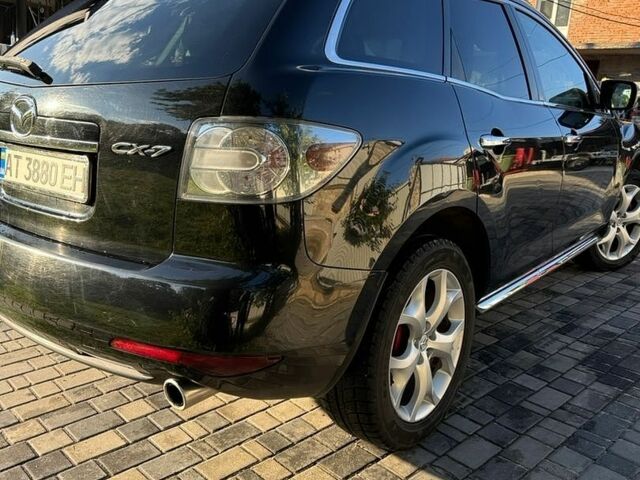 Черный Мазда СХ-7, объемом двигателя 2.18 л и пробегом 304 тыс. км за 9000 $, фото 13 на Automoto.ua