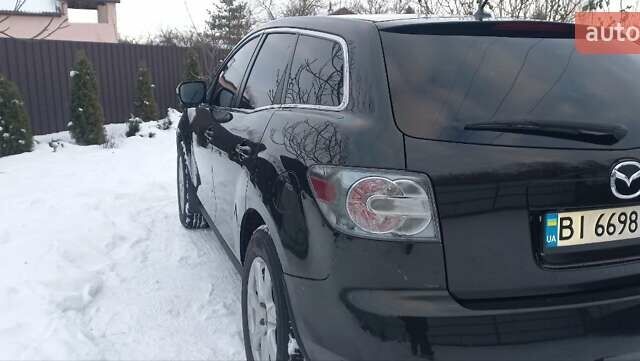 Черный Мазда СХ-7, объемом двигателя 2.2 л и пробегом 166 тыс. км за 9200 $, фото 41 на Automoto.ua