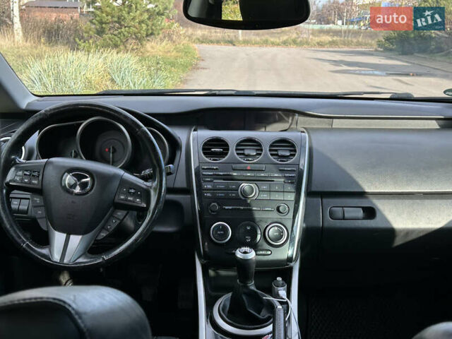 Черный Мазда СХ-7, объемом двигателя 2.2 л и пробегом 211 тыс. км за 9950 $, фото 7 на Automoto.ua