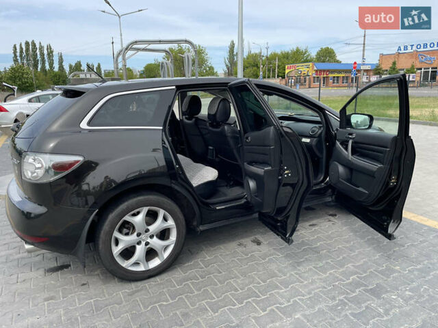 Черный Мазда СХ-7, объемом двигателя 2.26 л и пробегом 185 тыс. км за 9500 $, фото 9 на Automoto.ua