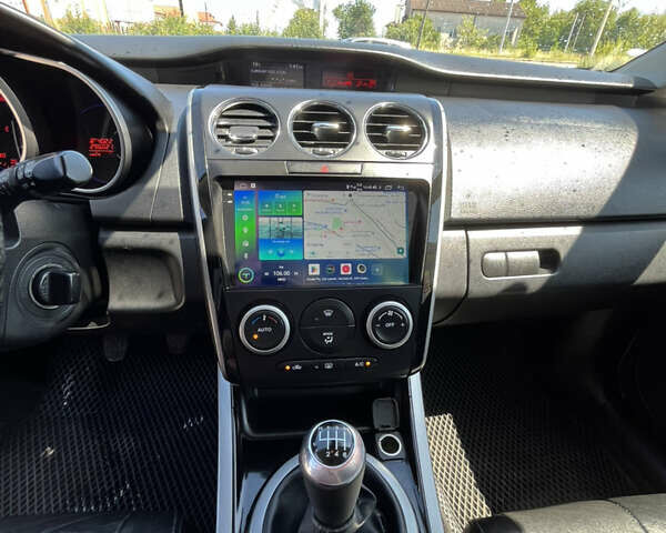 Черный Мазда СХ-7, объемом двигателя 2.2 л и пробегом 296 тыс. км за 9300 $, фото 1 на Automoto.ua