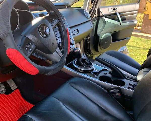 Черный Мазда СХ-7, объемом двигателя 2.2 л и пробегом 174 тыс. км за 11600 $, фото 19 на Automoto.ua