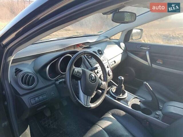 Черный Мазда СХ-7, объемом двигателя 2.2 л и пробегом 215 тыс. км за 10500 $, фото 19 на Automoto.ua