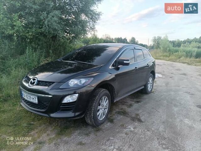 Черный Мазда СХ-7, объемом двигателя 2.18 л и пробегом 265 тыс. км за 10250 $, фото 5 на Automoto.ua