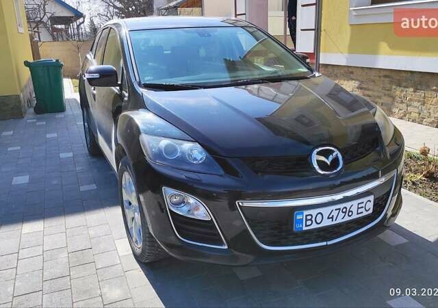 Черный Мазда СХ-7, объемом двигателя 2.18 л и пробегом 200 тыс. км за 9999 $, фото 1 на Automoto.ua