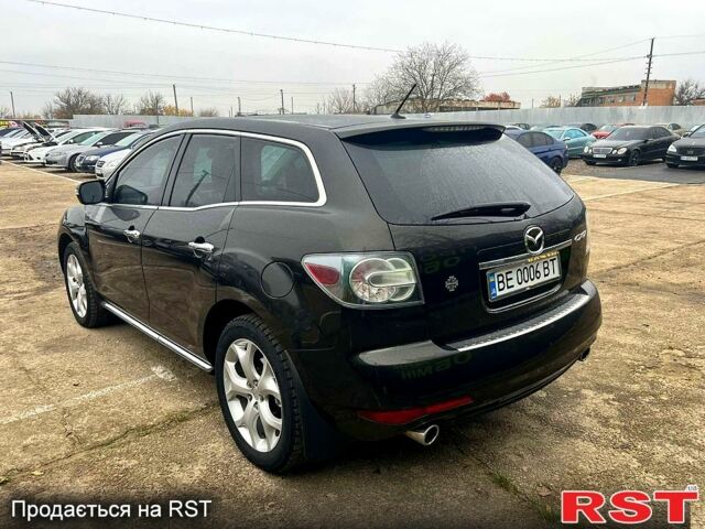 Черный Мазда СХ-7, объемом двигателя 2.3 л и пробегом 0 тыс. км за 11000 $, фото 1 на Automoto.ua