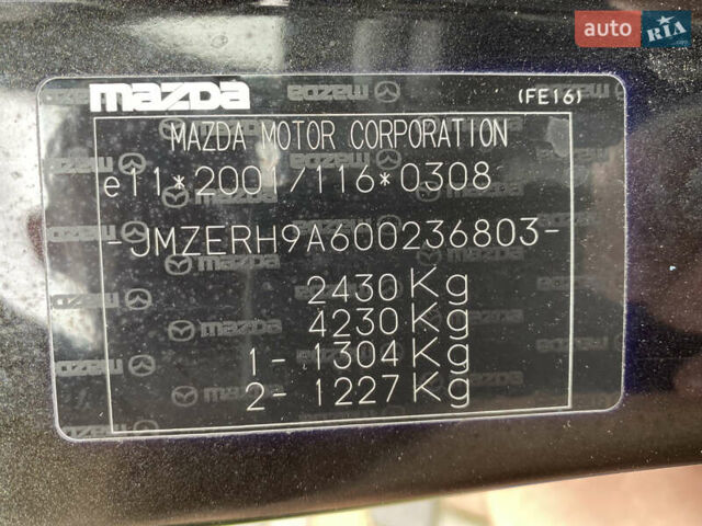 Чорний Мазда СХ-7, об'ємом двигуна 2.2 л та пробігом 132 тис. км за 11200 $, фото 18 на Automoto.ua