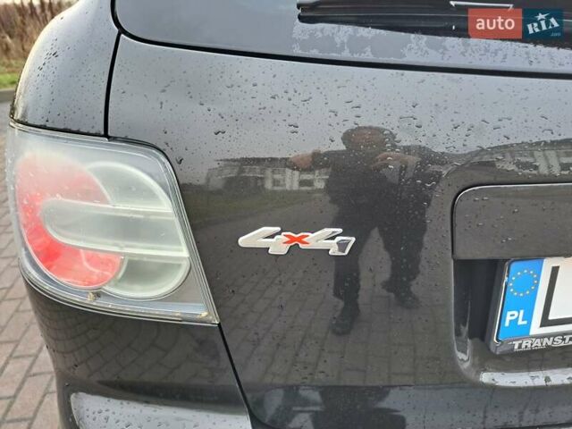 Черный Мазда СХ-7, объемом двигателя 2.2 л и пробегом 256 тыс. км за 4950 $, фото 12 на Automoto.ua