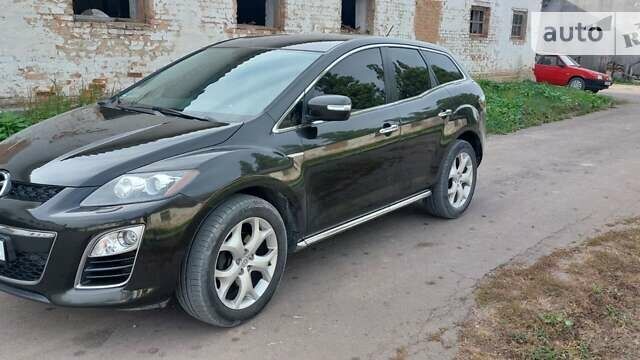 Черный Мазда СХ-7, объемом двигателя 2.2 л и пробегом 211 тыс. км за 13000 $, фото 1 на Automoto.ua