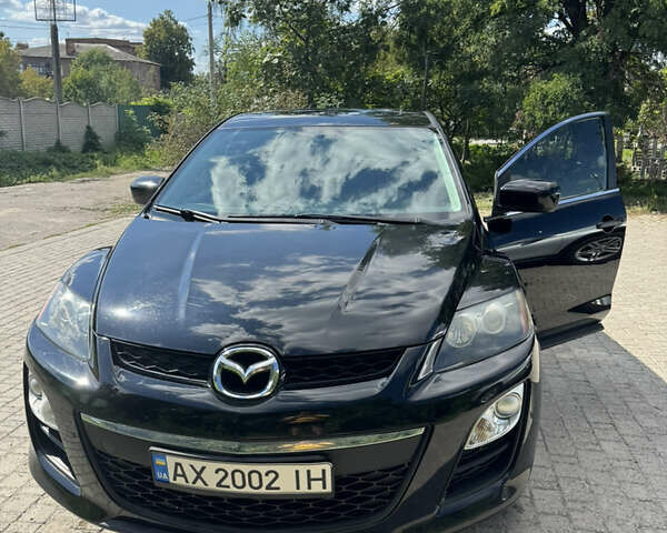 Чорний Мазда СХ-7, об'ємом двигуна 2.5 л та пробігом 263 тис. км за 8800 $, фото 1 на Automoto.ua
