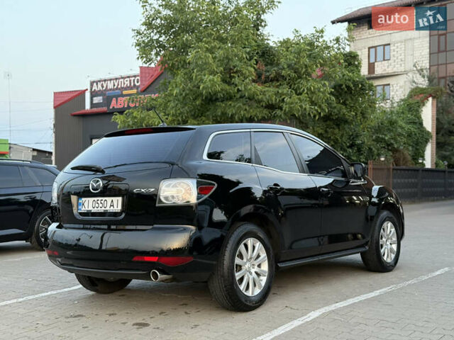 Черный Мазда СХ-7, объемом двигателя 2.5 л и пробегом 102 тыс. км за 10800 $, фото 4 на Automoto.ua