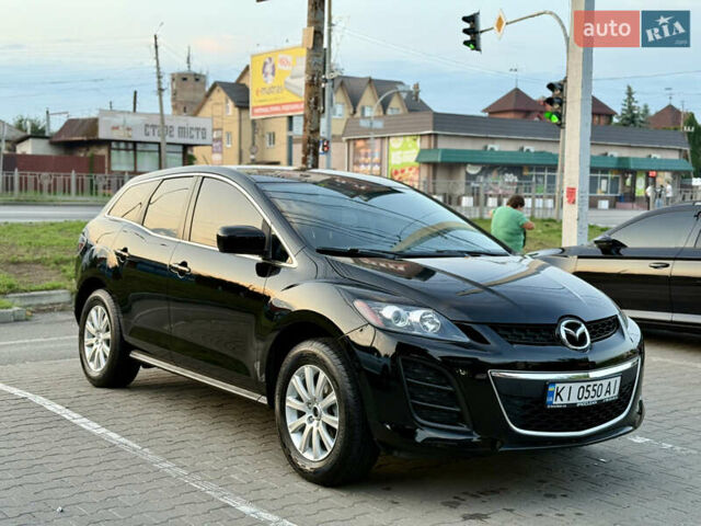 Черный Мазда СХ-7, объемом двигателя 2.5 л и пробегом 102 тыс. км за 10800 $, фото 1 на Automoto.ua