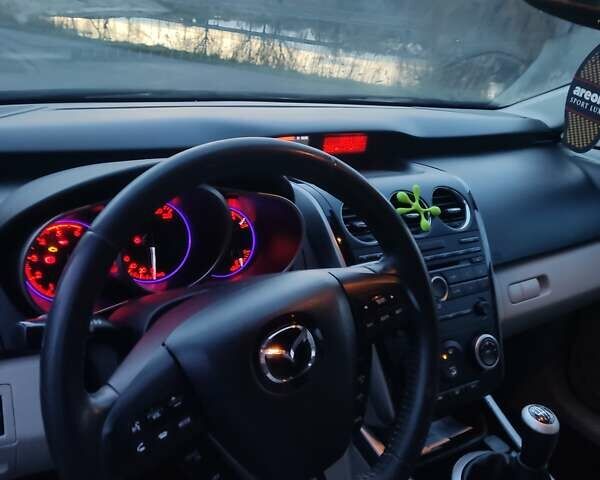 Черный Мазда СХ-7, объемом двигателя 2.2 л и пробегом 261 тыс. км за 10550 $, фото 10 на Automoto.ua