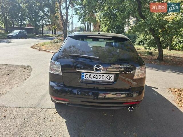 Черный Мазда СХ-7, объемом двигателя 2.2 л и пробегом 200 тыс. км за 10000 $, фото 11 на Automoto.ua