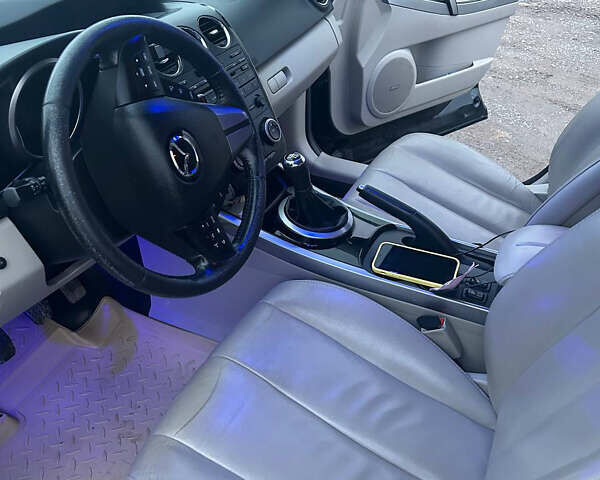 Черный Мазда СХ-7, объемом двигателя 2.2 л и пробегом 245 тыс. км за 10200 $, фото 8 на Automoto.ua