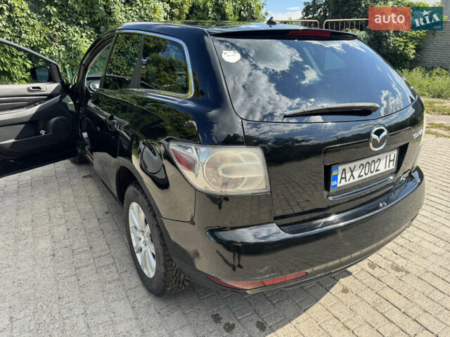 Чорний Мазда СХ-7, об'ємом двигуна 2.5 л та пробігом 263 тис. км за 8800 $, фото 13 на Automoto.ua