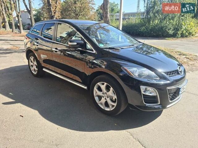 Черный Мазда СХ-7, объемом двигателя 2.2 л и пробегом 200 тыс. км за 10000 $, фото 4 на Automoto.ua