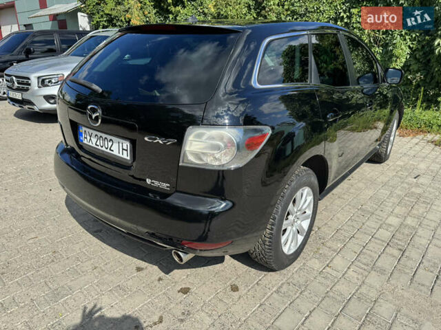 Чорний Мазда СХ-7, об'ємом двигуна 2.5 л та пробігом 263 тис. км за 8800 $, фото 17 на Automoto.ua