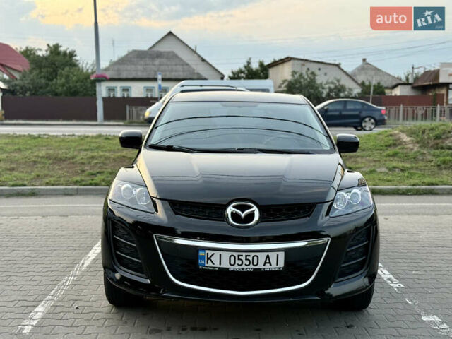 Черный Мазда СХ-7, объемом двигателя 2.5 л и пробегом 102 тыс. км за 10800 $, фото 2 на Automoto.ua