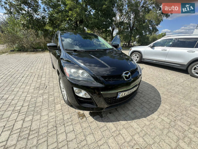 Чорний Мазда СХ-7, об'ємом двигуна 2.5 л та пробігом 263 тис. км за 8800 $, фото 30 на Automoto.ua