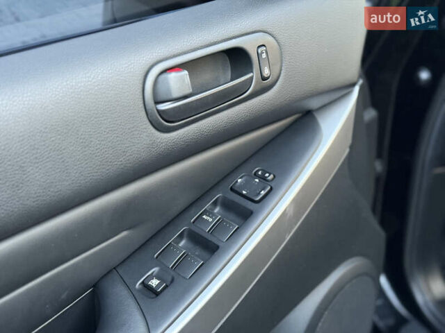 Черный Мазда СХ-7, объемом двигателя 2.5 л и пробегом 102 тыс. км за 10800 $, фото 20 на Automoto.ua