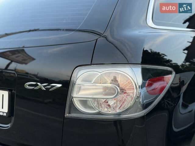 Черный Мазда СХ-7, объемом двигателя 2.5 л и пробегом 102 тыс. км за 10800 $, фото 12 на Automoto.ua