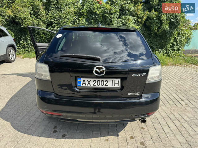 Чорний Мазда СХ-7, об'ємом двигуна 2.5 л та пробігом 263 тис. км за 8800 $, фото 14 на Automoto.ua