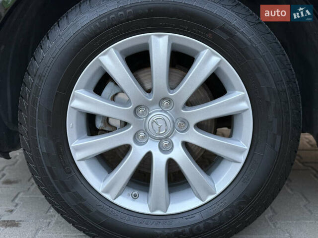 Черный Мазда СХ-7, объемом двигателя 2.5 л и пробегом 102 тыс. км за 10800 $, фото 11 на Automoto.ua