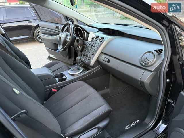 Черный Мазда СХ-7, объемом двигателя 2.5 л и пробегом 102 тыс. км за 10800 $, фото 28 на Automoto.ua