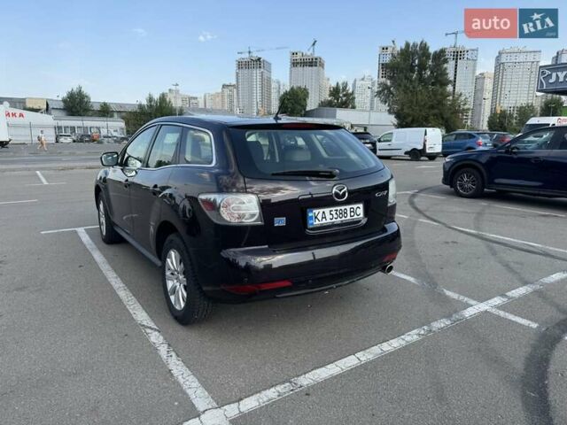 Чорний Мазда СХ-7, об'ємом двигуна 2.5 л та пробігом 180 тис. км за 10500 $, фото 4 на Automoto.ua