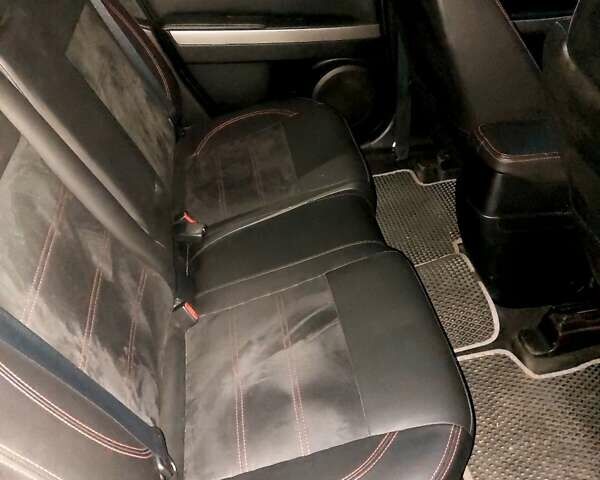 Чорний Мазда СХ-7, об'ємом двигуна 2.5 л та пробігом 210 тис. км за 10900 $, фото 6 на Automoto.ua